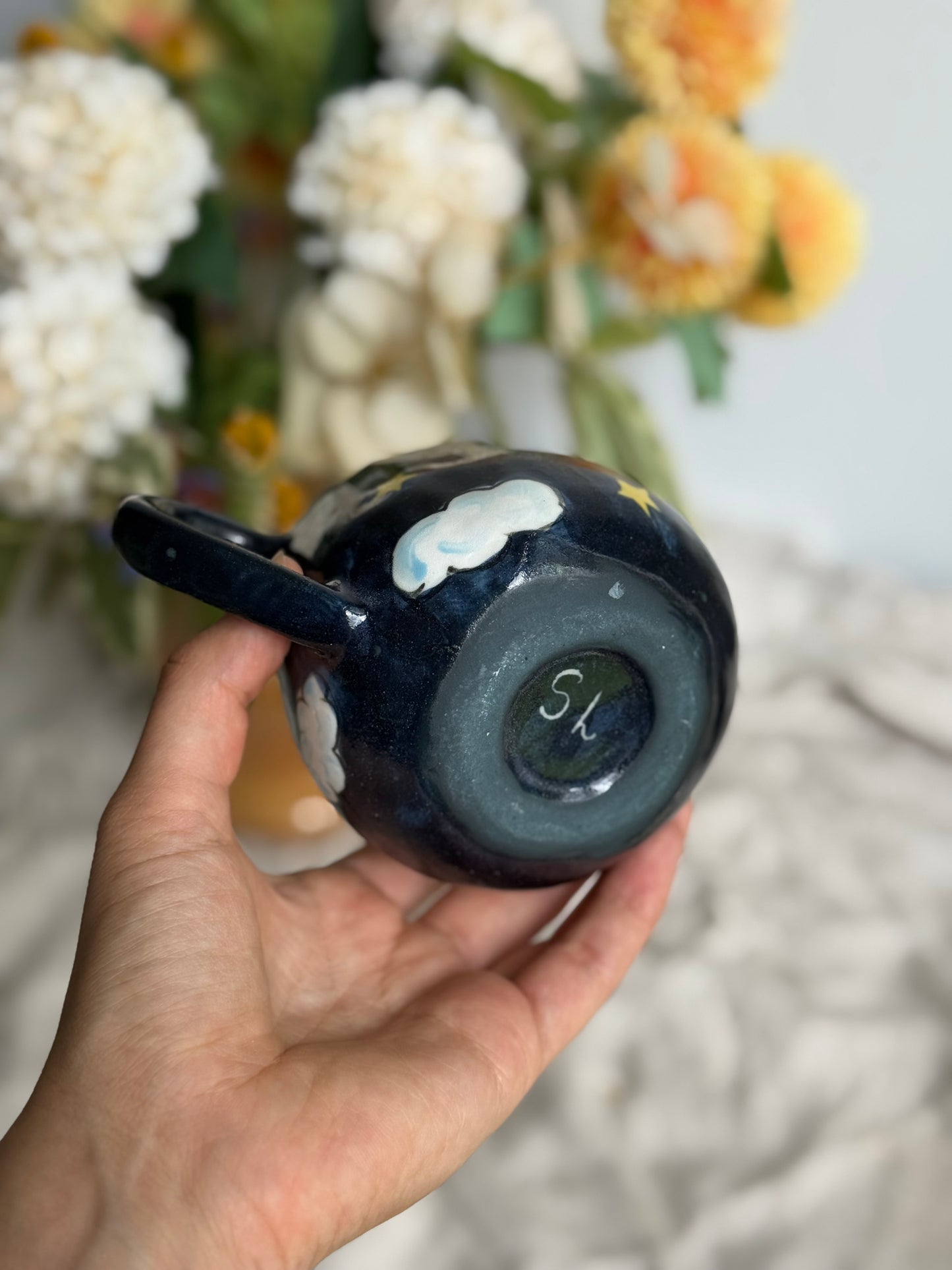 Sleeping kitten on cloud mug lifestyle shot – handmade ceramic gift Australia