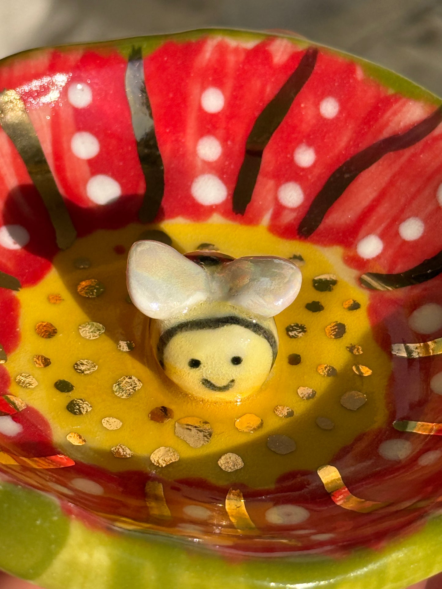 Busy Bee jewelry dish styled with rings - handmade ceramic gift