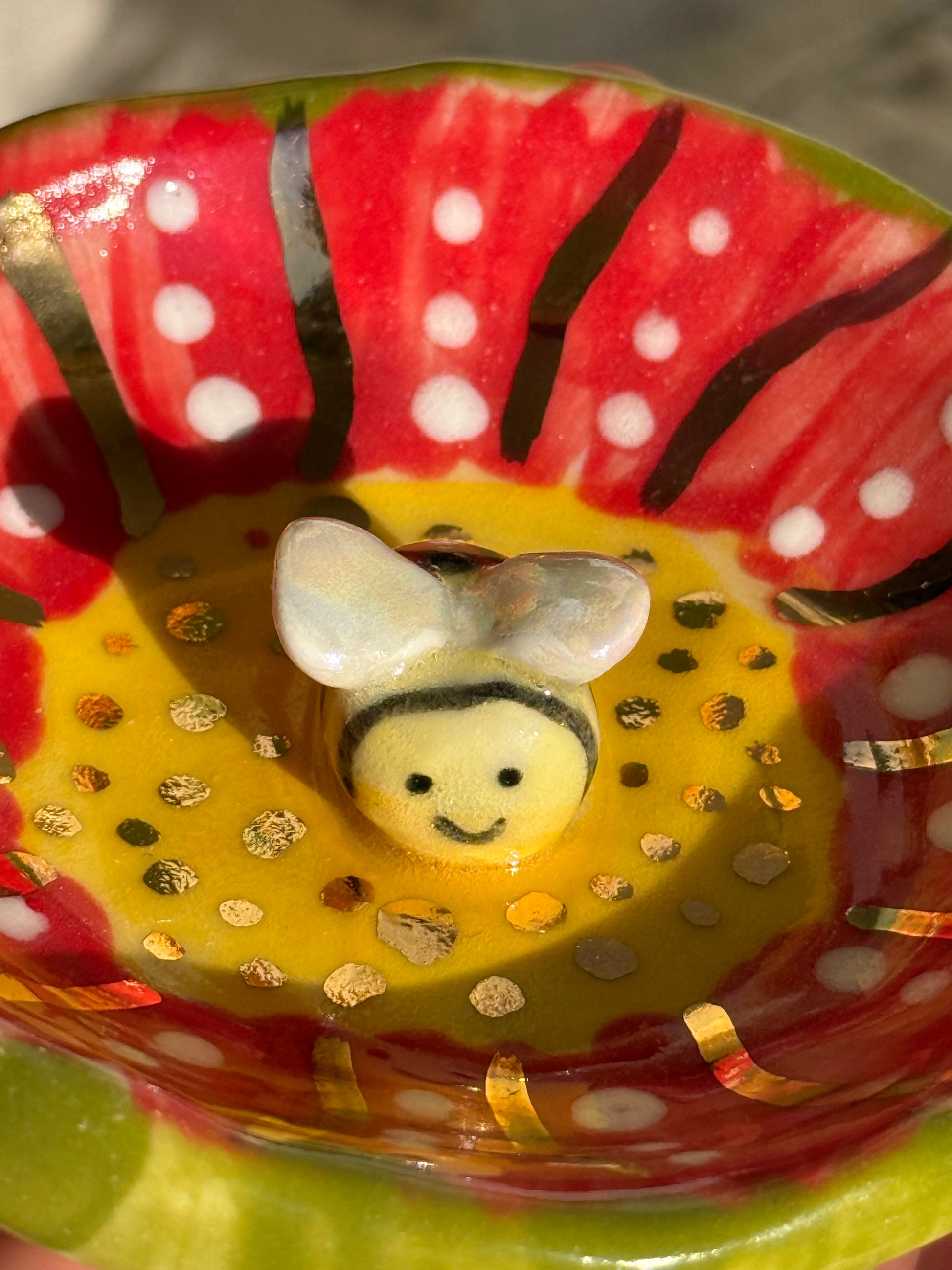 Busy Bee jewelry dish styled with rings - handmade ceramic gift