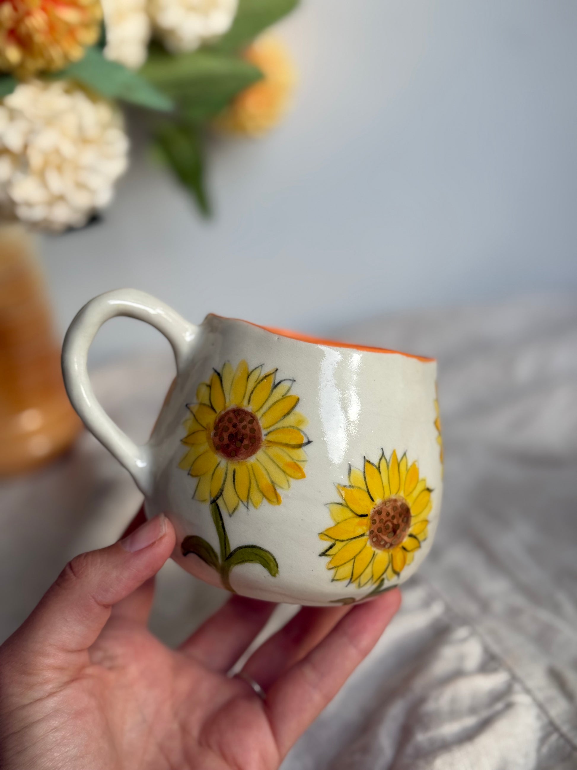Handmade mug with sunflowers and golden dots
