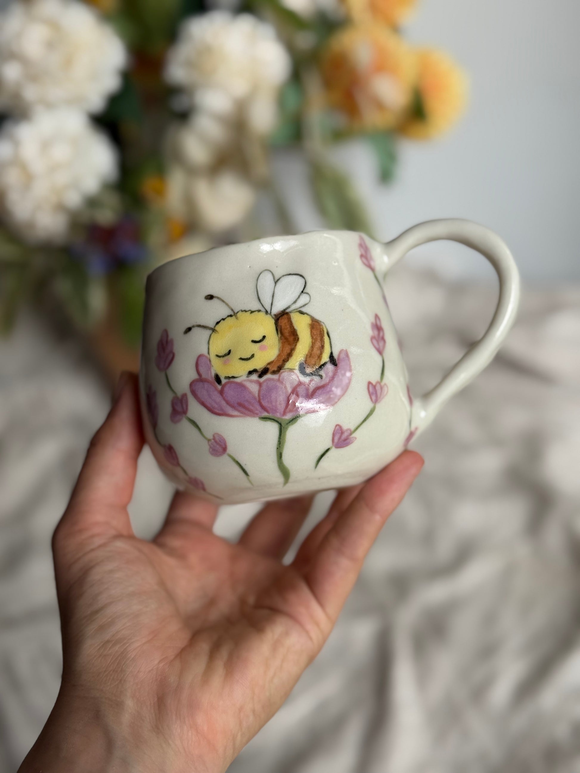 Bee ceramic mug styled with tea – handmade pottery gift Australia