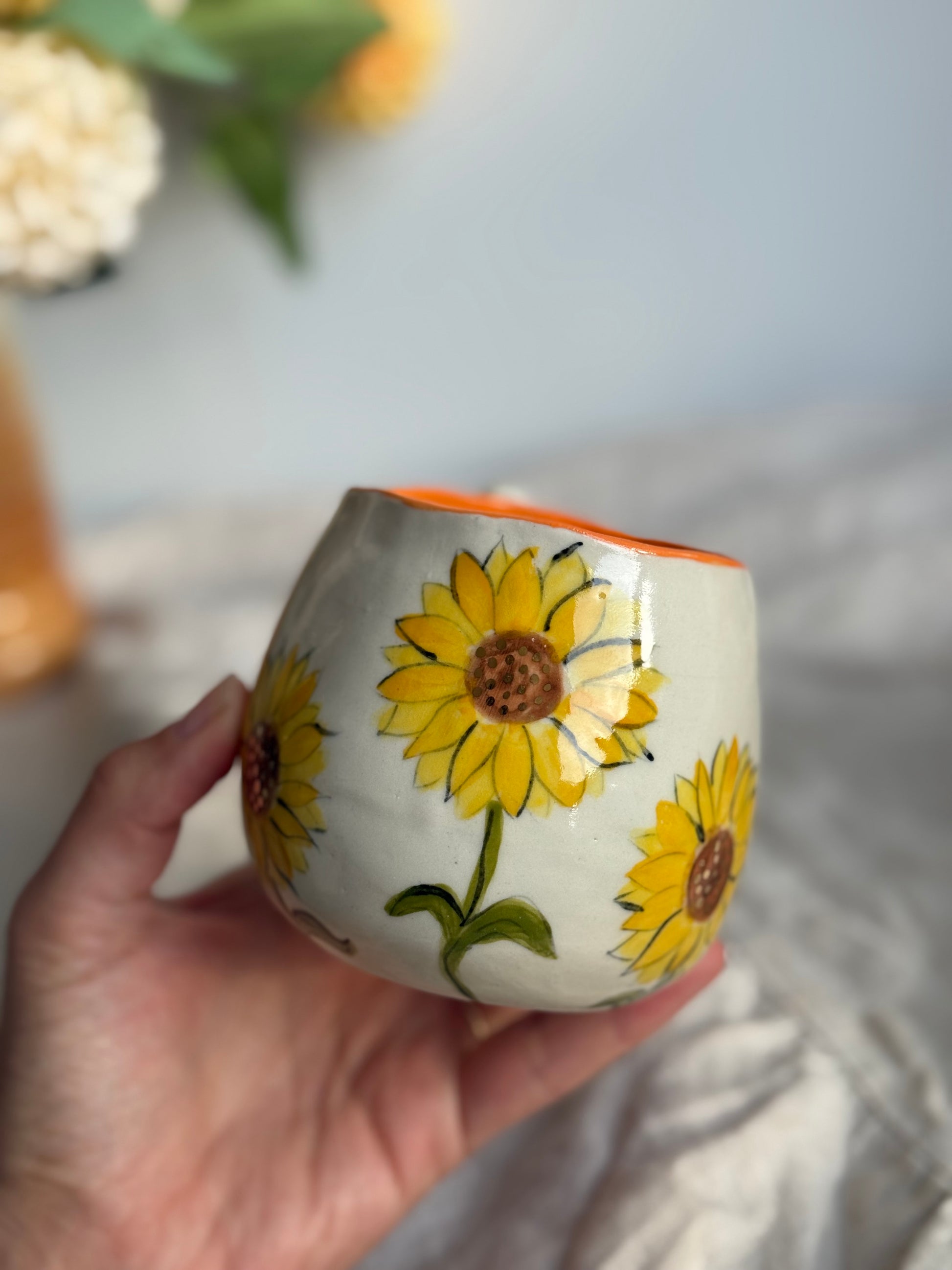 Mug with sunflowers front view 